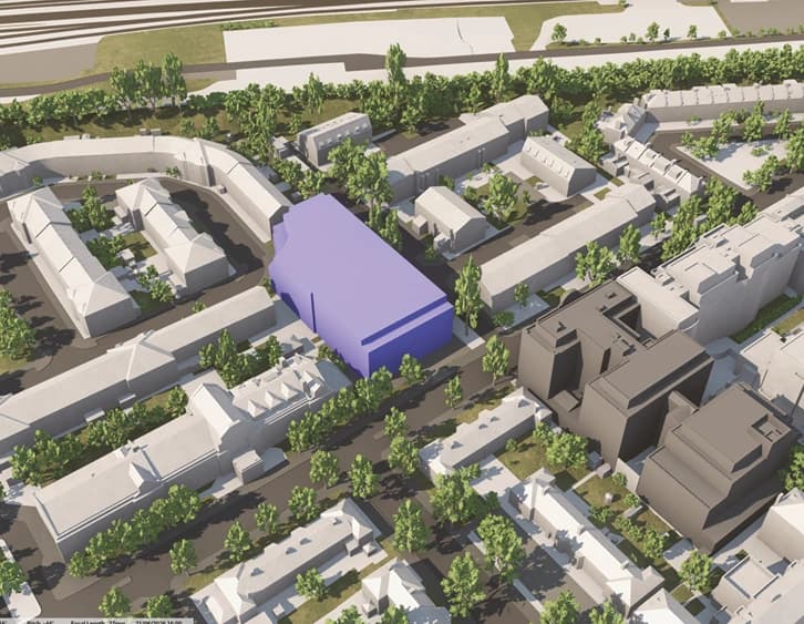 Illustrative massing of the site, shown in blue, among the surrounding streets.