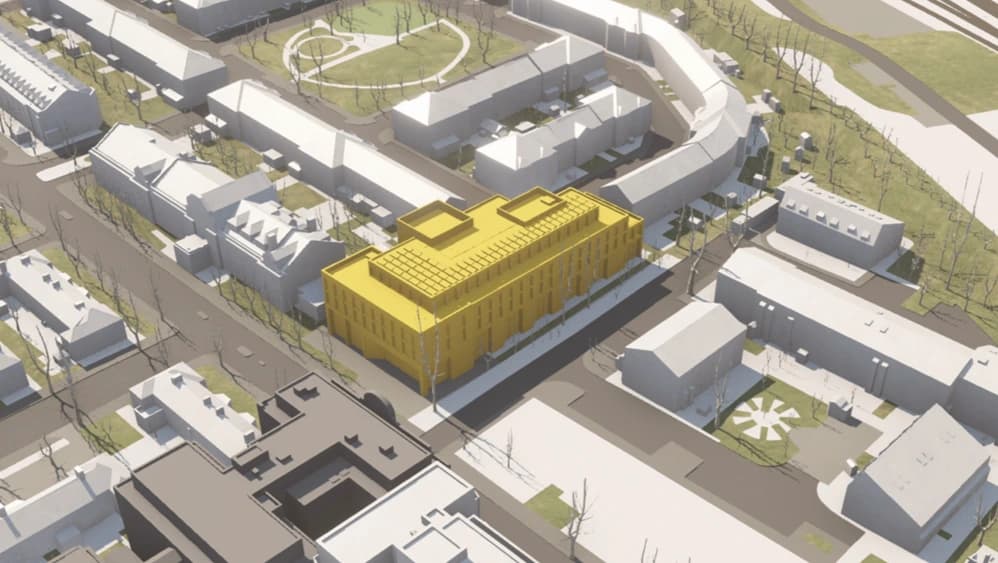 Illustrative massing of the site, shown in yellow, among the surrounding streets.